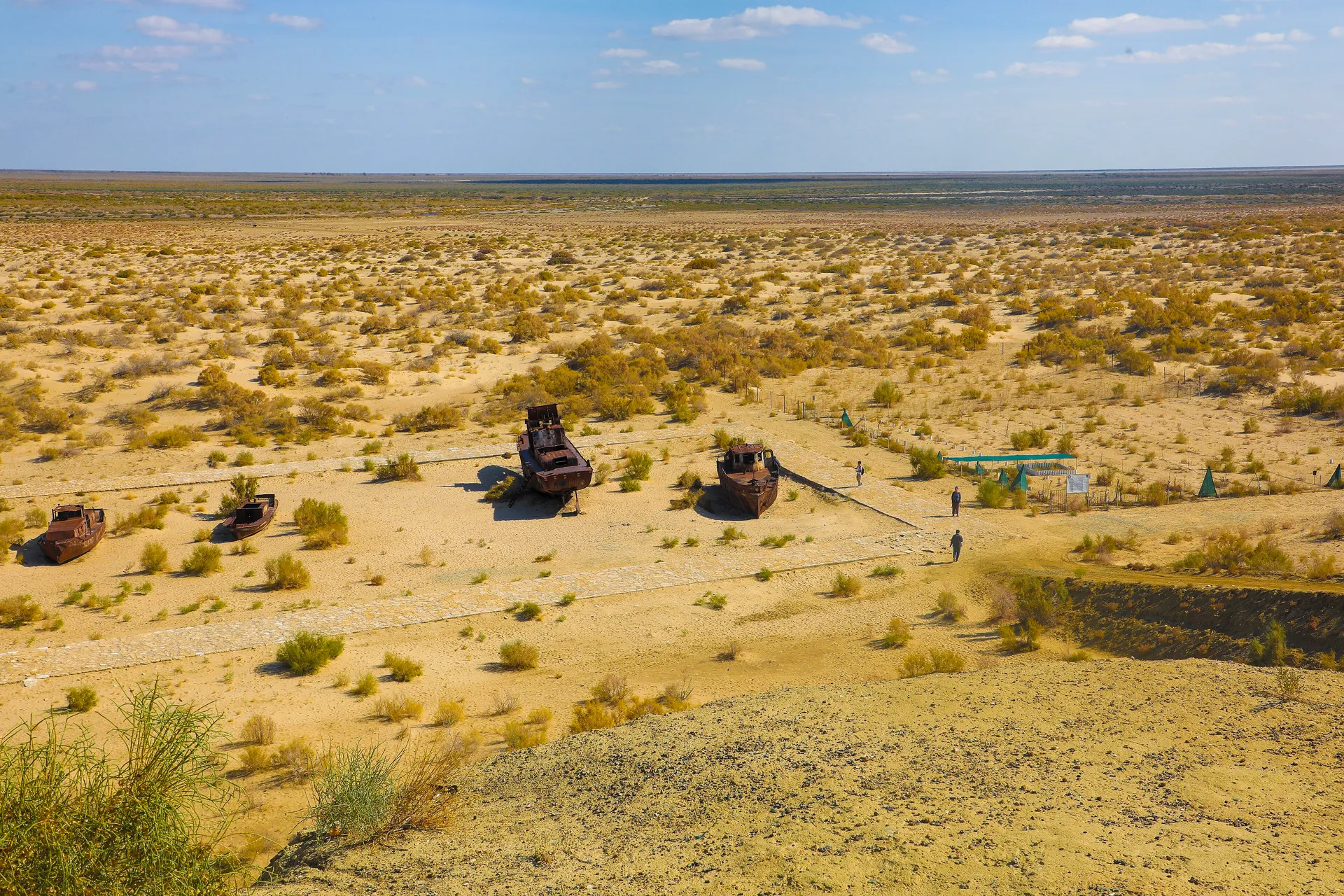 Rusting fishing boats on the sand at Moynaq, once a port on the Aral Sea. The shore is now more than a hundred kilometres away.