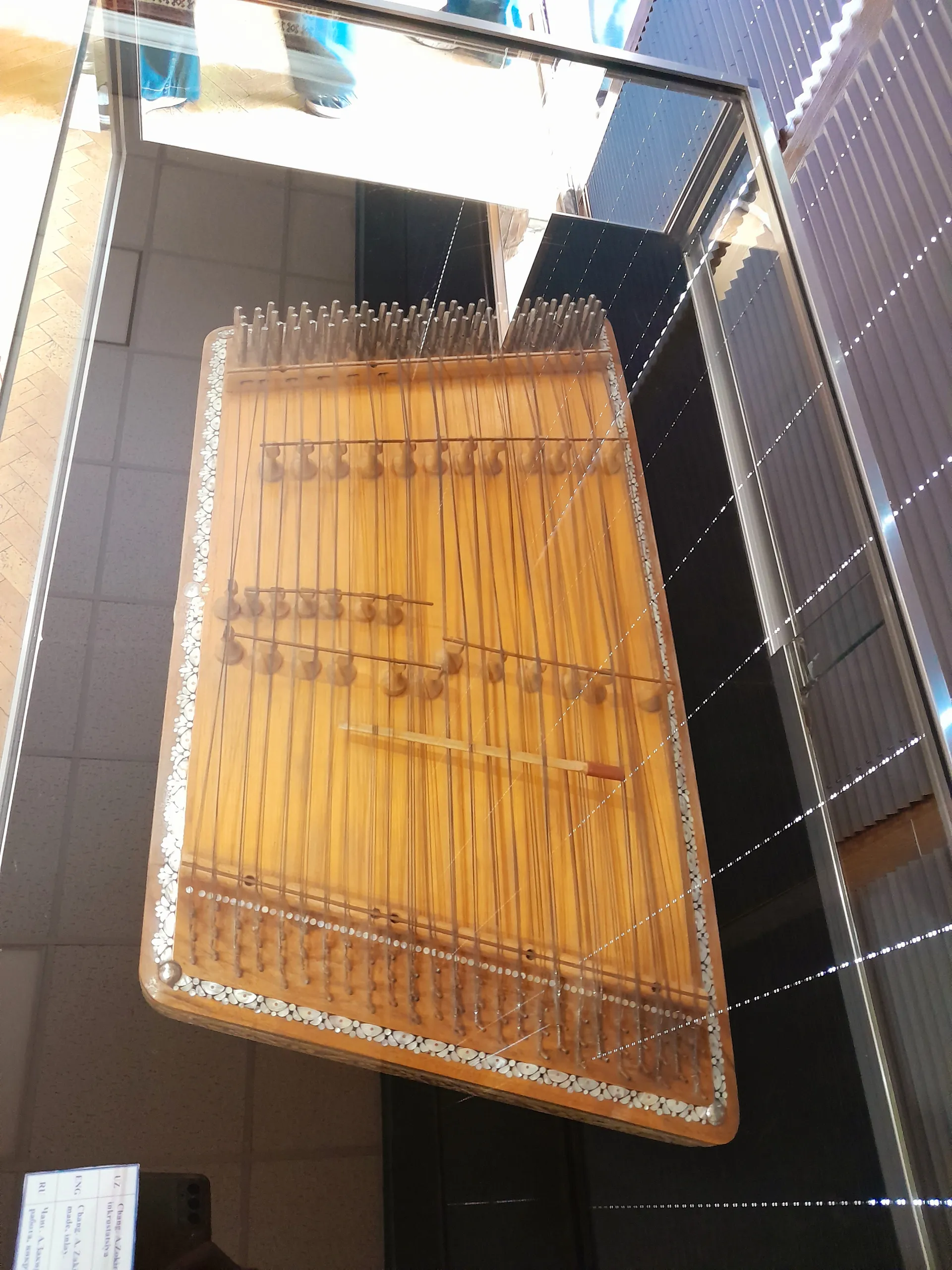A chang, the struck zither of Uzbek classical music, inlaid with mother-of-pearl — part of the ensemble that plays the maqom.