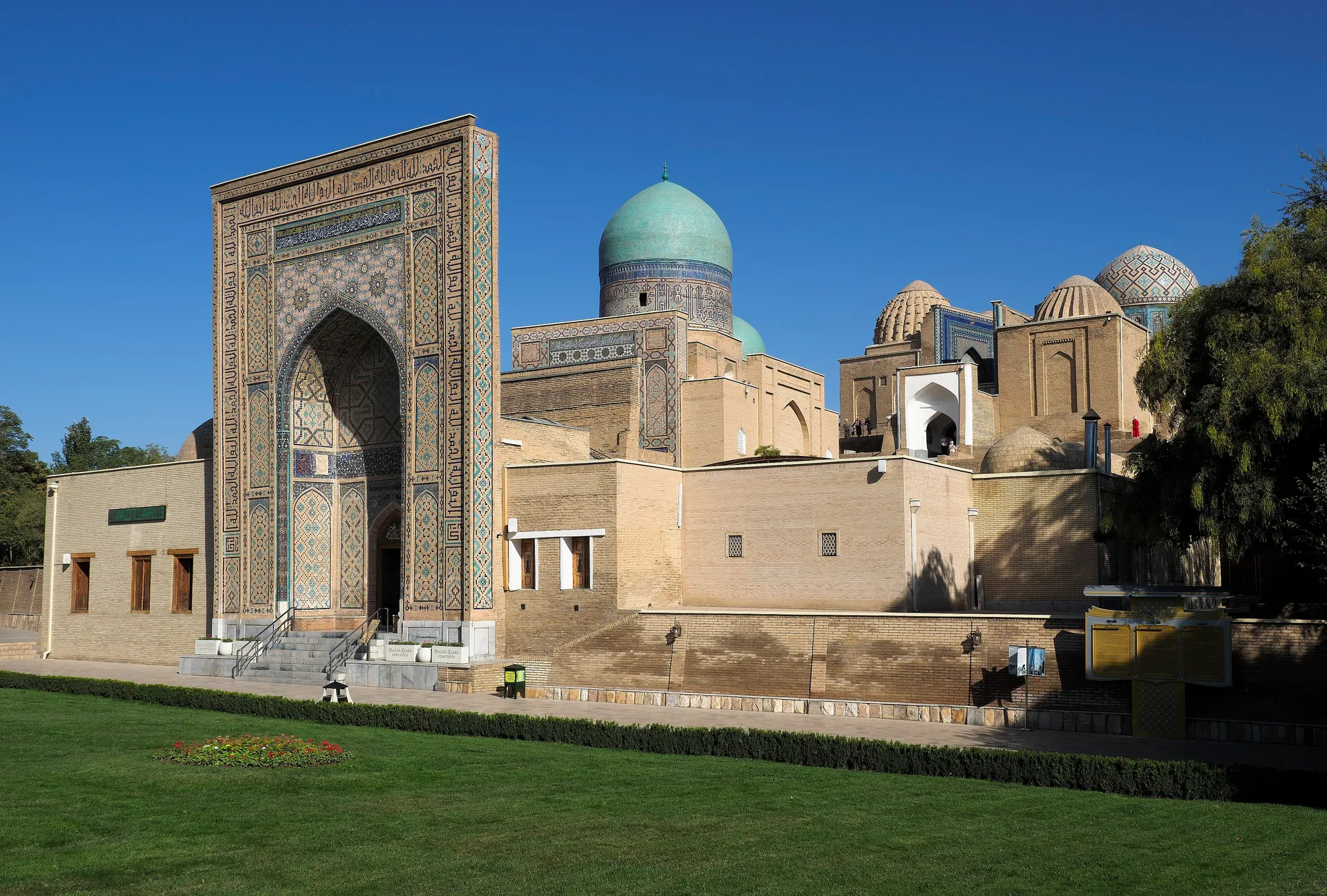 Portals and domes of the Timurid mausoleums at the top of the Shah-i-Zinda hill, around the shrine of Qusam ibn Abbas.