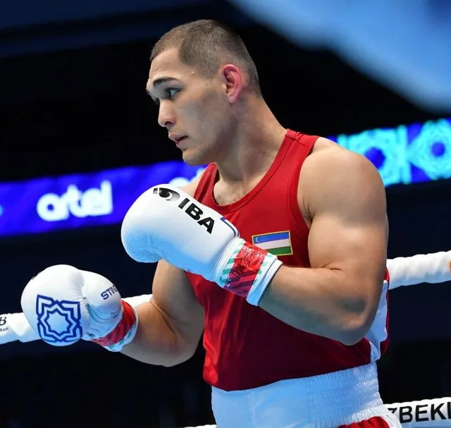 Uzbek boxer Shohjahon Abdullayev at a world championships. Boxing has become the country's most successful Olympic sport.